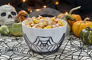 Bowl full of candy corn in a Halloween theme