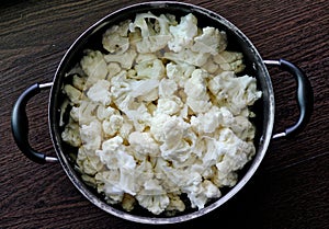 A bowl full of cauliflower buds photo