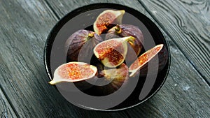 Bowl full of cut figs