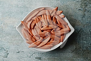 bowl full of uncooked red foglie di ulivo italian pasta