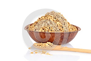 Bowl of granola with wood spoon