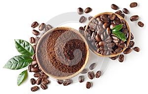 Bowl of ground coffee and beans isolated on white background