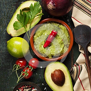 Bowl of guacamole with fresh ingredients