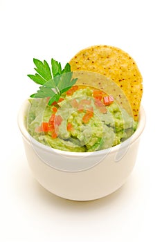 Bowl of guacamole isolated