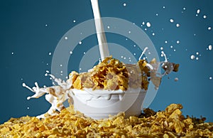 Bowl of Healthy Corn Flakes with Splashing Milk for Breakfast