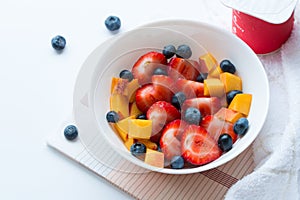 Bowl of healthy fresh berries fruit salad