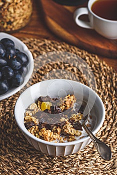 Bowl of Homemade Granola with Dried Fruits and Crushed Chocolate