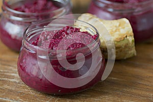 Bowl of homemade Red Chrain, a spicy paste made of grated Horseradish Armoracia rusticana, syn. Cochlearia armoracia and Beetroo