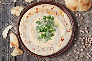 Bowl of hummus, creamy vegetarian food with chick