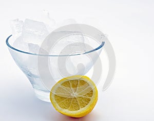 Bowl of ice with lemon