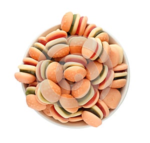 Bowl with jelly candies in shape of burger on white background, top view