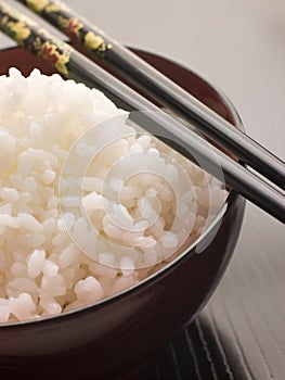 Bowl of Koshihikari Rice with chop sticks