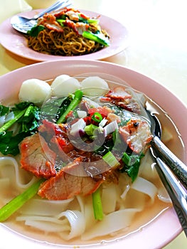 A bowl of kway tiao soup photo