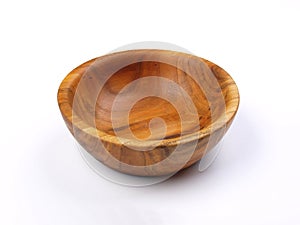 Bowl made of wood. Household kitchen utensils of walnut wood for dining