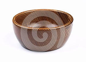 Bowl made of wood. Household kitchen utensils of walnut wood for dining