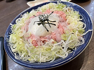 A bowl of minced tuna belly on sushi rice