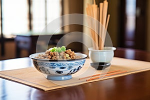 a bowl of natto fermented soybeans on a table