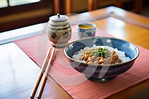 a bowl of natto fermented soybeans on a table
