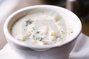 Bowl of New England clam chowder photo