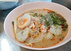 Bowl of Noodles with Slice Fish Sausage and Boil Egg