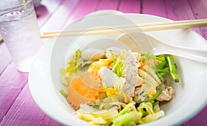 Bowl of noodles with vegetables