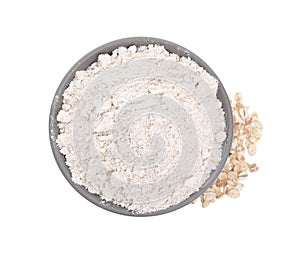 Bowl with oat flour and flakes on white background, top view