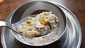 Bowl of oatmeal and a spoon