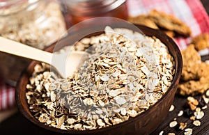 Bowl of oats porridge isolated on background