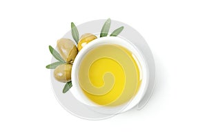 Bowl with olive oil and olives isolated on background, top view