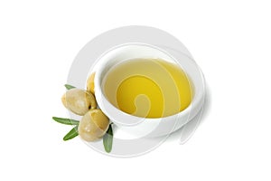 Bowl with olive oil, olives and leaves isolated on background