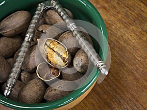 Bowl of Pecans with Nut Cracker
