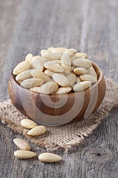 Bowl with peeled almonds photo