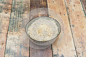 Small bowl of white rice ready to serve as garnish photo