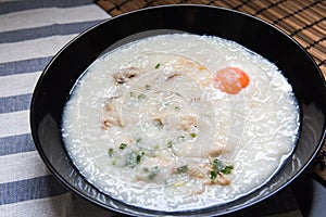 A bowl of porridge on background.