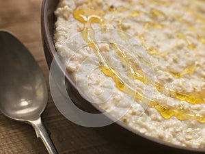 Bowl of Porridge with Golden Syrup