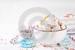 Bowl portion of birthday cake taste ice cream