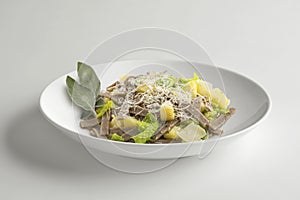 Bowl with portion of pizzoccheri