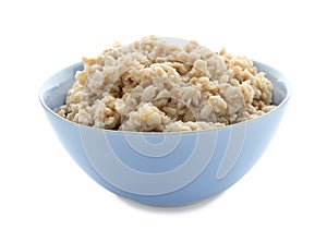 Bowl with prepared oatmeal on white background