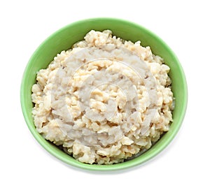 Bowl with prepared oatmeal on white background