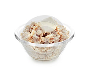 Bowl with prepared oatmeal on white background