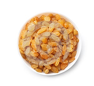 Bowl with raisins on white background, top view. Dried fruit