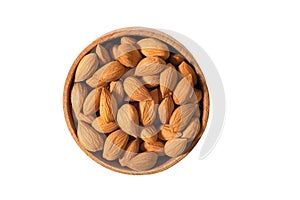 Bowl of raw almonds on a white background. Dried nuts, top view