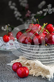 Bowl with red cherries food background