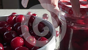 Bowl With Red Fresh Ripe Cherries On The Background Of A White Brick Wall