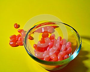 A bowl of red jellybeans