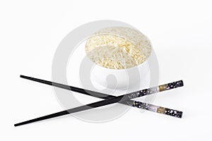 Bowl of rice with chopsticks