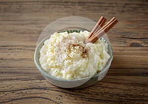 Bowl of rice milk pudding with cinnamon