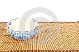 Bowl of rice on placemat in Asian style