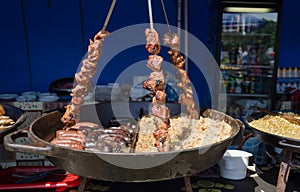 Bowl rice sausage switches with shashlik on stall