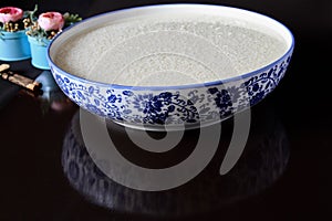 A bowl of rice soak in the water